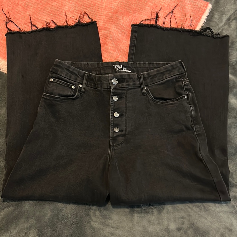 Worn. black. high rise and straight leg. baggy.